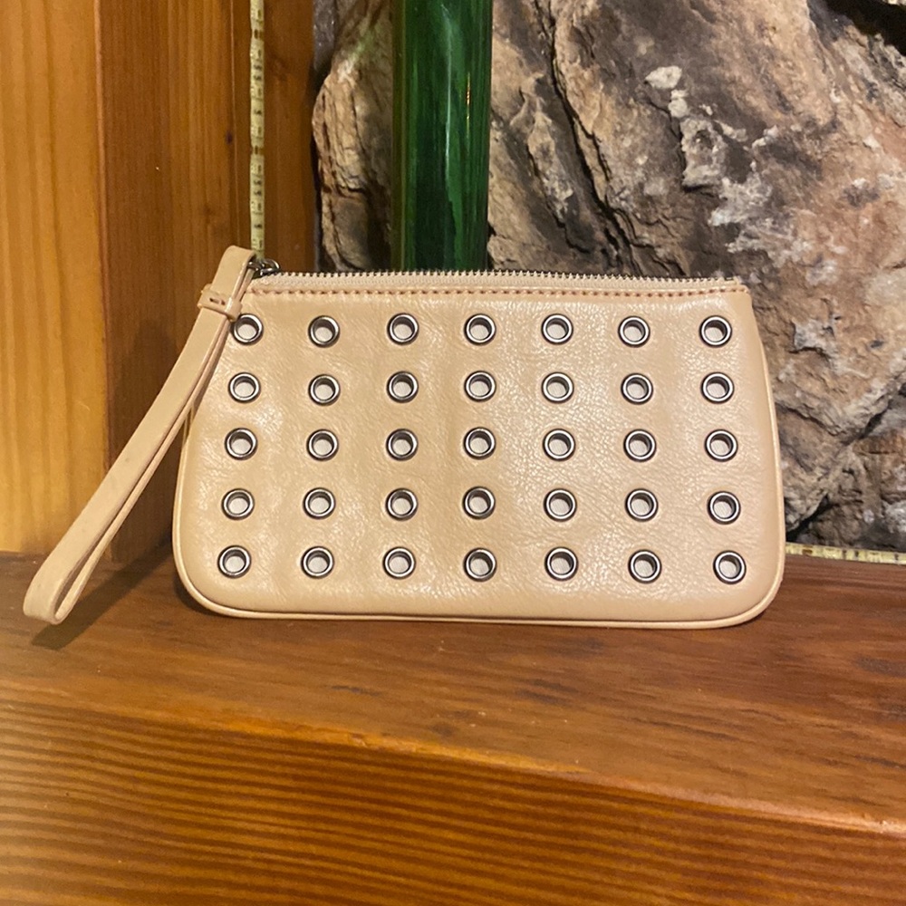 J. Crew tan leather wristlet with metal grommet detail. Beautiful condition!